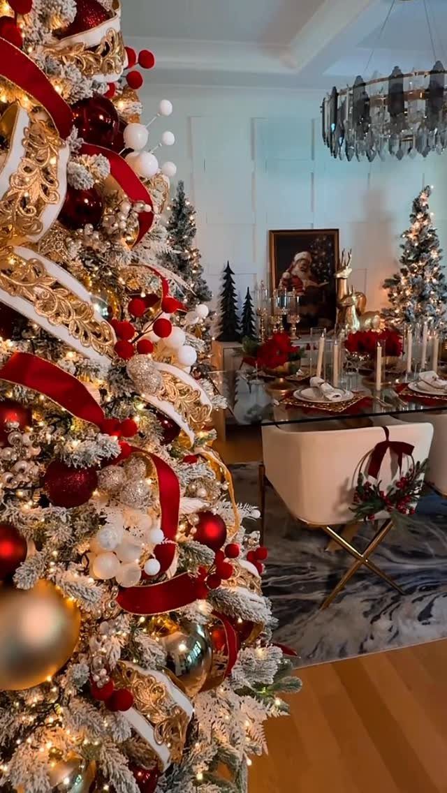 8 Christmas Tree Red and White Gold Decor Ideas for Holiday Elegance 5 Decorated Christmas tree with red, gold, and white ornaments and warm white lights in a dining room.