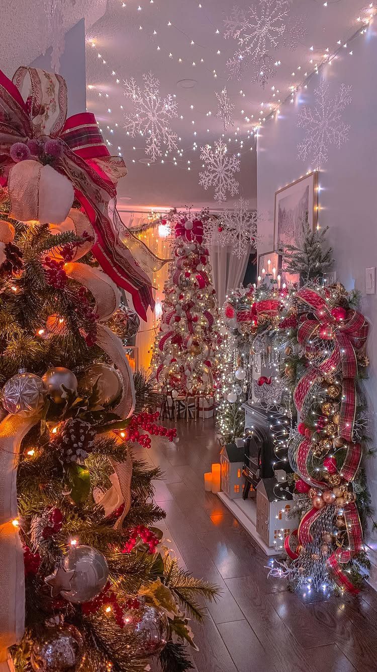Winter and Christmas: 3 Ways the Season Gathers People 2 Decorated Christmas trees and snowflake lights in a festive hallway setting.